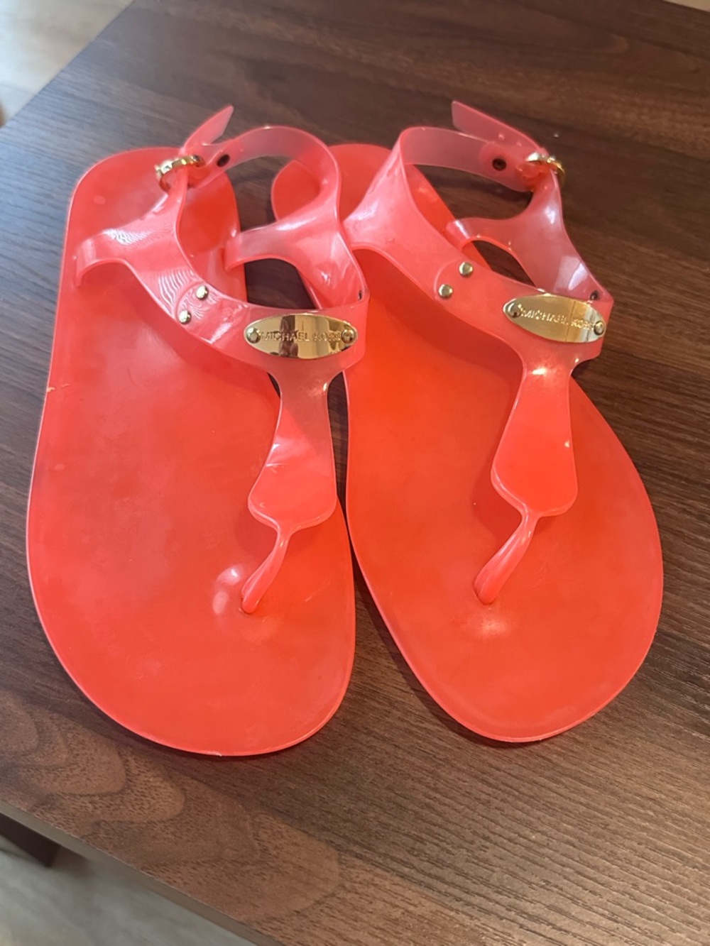 Michael Kors Bright Coral Jelly Thong Sandals with Gold Accents